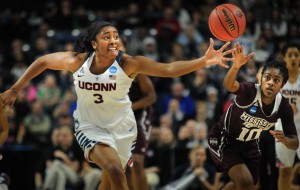 UConn women's basketball forward Morgan Tuck fights for a loose ball during a regional semifinal game of the 2016 NCAA women's tournament game against Mississippi State at Webster Bank Arena in Bridgeport, Connecticut. Photo by Bailey Wright