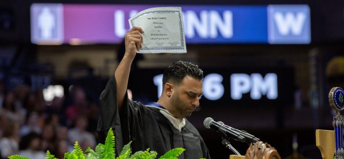 Joe La Puma ’05 (CLAS) delivers the commencement address at the College of Liberal Arts and Sciences commencement ceremony two in Gampel Pavilion on Sunday, May 11, 2025. (Bri Diaz/UConn Photo)